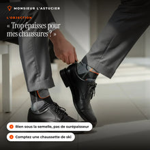 Chaussette chauffante enfilee dans une chaussure de ville, sans surepaisseur