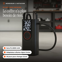 Gonfleur pneu sans fil sur un plan d'atelier : sans fil, 6000 mAh, adaptateur allume-cigare inclus