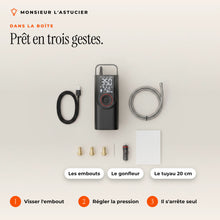 Contenu de la boite : gonfleur, tuyau 20 cm, embouts, cable et adaptateur allume-cigare