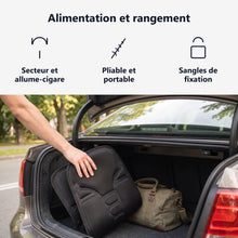 Coussin plié rangé dans un coffre de voiture, avec adaptateurs secteur et allume-cigare